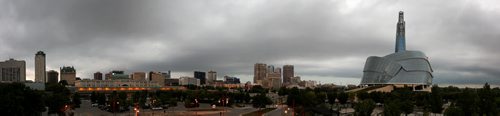 A storm front moves towards downtown Winnipeg as seen from The Forks parkade, Sunday, August 18, 2013. (TREVOR HAGAN/WINNIPEG FREE PRESS) - 9 image panorama  skyline
