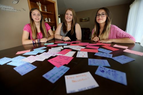 Mikayla Carter, 15, Marley St. Cyr, 15, and Mackenzie Carter, 13, left about 200 inspirational notes around downtown and The Forks, Sunday, August 18, 2013. (TREVOR HAGAN/WINNIPEG FREE PRESS) - see elizabeth fraser story