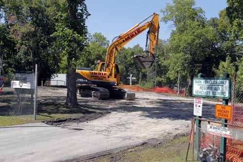Now you see it now you don't. The St. Vital Park shelter by the duck pond is leveled by demolition crews. The old one stood there for many decades and is to be replaced by a new modern one soon. BORIS MINKEVICH / WINNIPEG FREE PRESS. August 19, 2013.