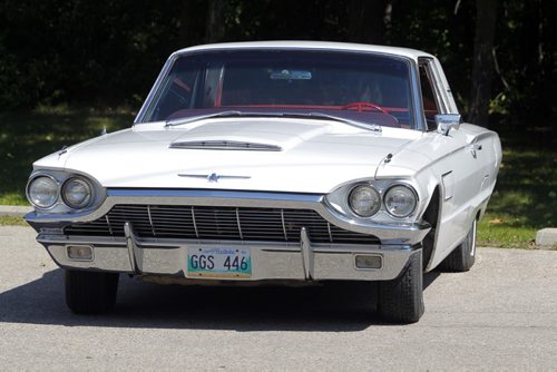 CLASSIC CARS - John Courcelles owns a classic car. A 1965 Thunderbird. BORIS MINKEVICH / WINNIPEG FREE PRESS. August 19, 2013.