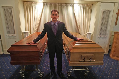 Kevin Sweryd, president and director of Bardal Funeral Homes with regular coffin, left, and oversized coffin for a oversized person-See Randy Turner story- August 19, 2013   (JOE BRYKSA / WINNIPEG FREE PRESS)