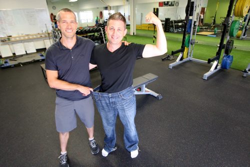 Jarrett Cormier, went from a size 38 to size 32 after training hard at  Pure Lifestyle gym, 1129 Empress - He believes the gym  Saved his life from obesity related illness he is with Blake Wood his trainer-See Randy Turner story- August 19, 2013   (JOE BRYKSA / WINNIPEG FREE PRESS)