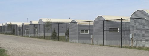 A row of temporary housing north of Williston, whose population has doubled in three years. While some of these developments cater to families, others are known as "man camps." August 18 2013. BARTLEY KIVES/WINNIPEG FREE PRESS