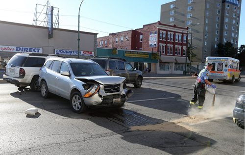 4 veihcle mvc , three SUV's and a motor scooter are reducing South bound  Main St. at Euclid Ave and Jarvis Ave  to one lane , there are only minor injury  with  several people shaken up . KEN GIGLIOTTI / Aug 20 2013 / WINNIPEG FREE PRESS