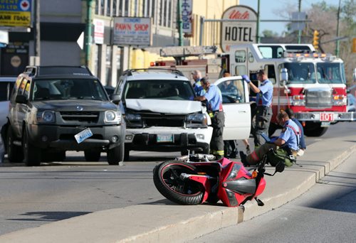 4 veihcle mvc , three SUV's and a motor scooter are reducing South bound  Main St. at Euclid Ave and Jarvis Ave  to one lane , there are only minor injury  with  several people shaken up . KEN GIGLIOTTI / Aug 20 2013 / WINNIPEG FREE PRESS
