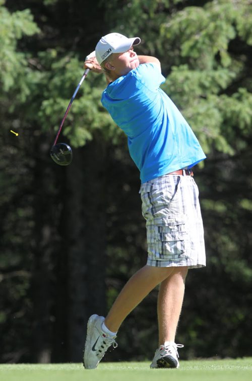 Brandon Sun 18082013 Nick Myhre of Rolette, North Dakota tees off during junior men's medal play at the Tamarack Golf Tournament at Clear Lake Golf Course on Monday. (Tim Smith/Brandon Sun)
