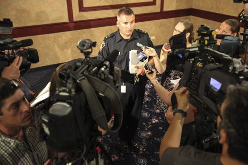 Public Information Officer, Constable Jason Michalysen, providing news of the day to media in the Millennium Suite at the Winnipeg Convention Centre. The Canadian Association of Chiefs of Police (CACP) conducted a media conference today at the centre to address a new marijuana enforcement proposal and the economics of policing as a part of their 108th Annual General Meeting. Tuesday, August 20, 2013. (JAMES TURNER) (JESSICA BURTNICK/WINNIPEG FREE PRESS)