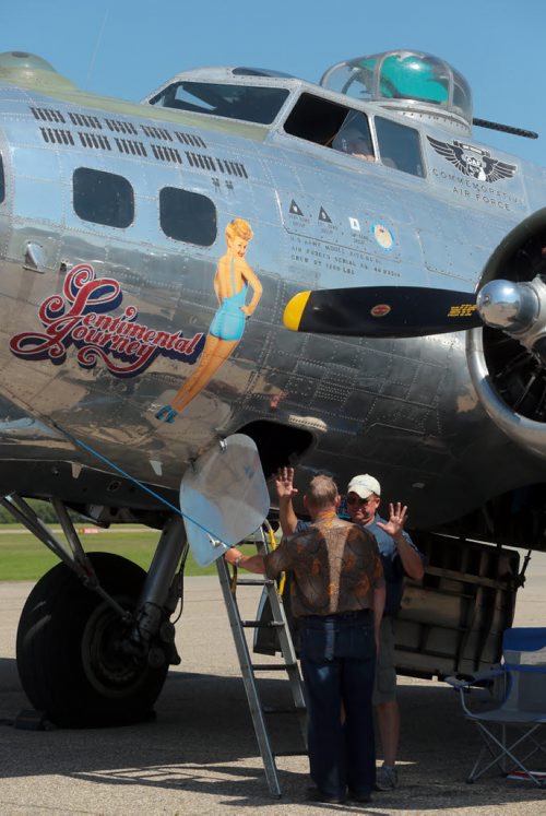 Brandon Sun Visitor is given advise from a crew member of the Sentimental Journey, one of ten B-17 Flying Fortresses still airworthy, at the Commonwealth Air Training Plan Musem, on Tuesday afternoon. The plane will be on display from noon to 2:30 p.m., today and Thursday with scheduled flights for paying customers later in the afternoon. SEE LINDSEY
