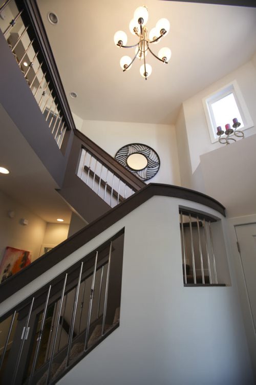 (Stairwell) This A&S Homes show home located at 10 Tychonick Bay in Kildonan Green features 3 bedrooms, two and a half bathrooms, and modern open living spaces on the main floor. Wednesday, August 21, 2013. (JESSICA BURTNICK/WINNIPEG FREE PRESS)