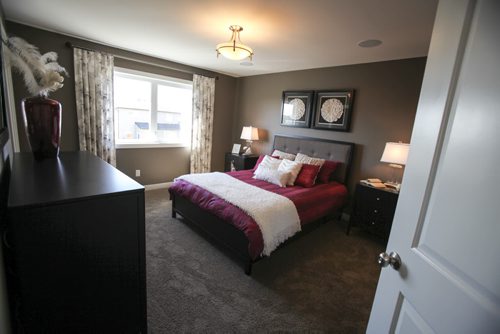 (Master bedroom) This A&S Homes show home located at 10 Tychonick Bay in Kildonan Green features 3 bedrooms, two and a half bathrooms, and modern open living spaces on the main floor. Wednesday, August 21, 2013. (JESSICA BURTNICK/WINNIPEG FREE PRESS)