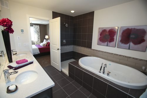 (Ensuite bathroom) This A&S Homes show home located at 10 Tychonick Bay in Kildonan Green features 3 bedrooms, two and a half bathrooms, and modern open living spaces on the main floor. Wednesday, August 21, 2013. (JESSICA BURTNICK/WINNIPEG FREE PRESS)