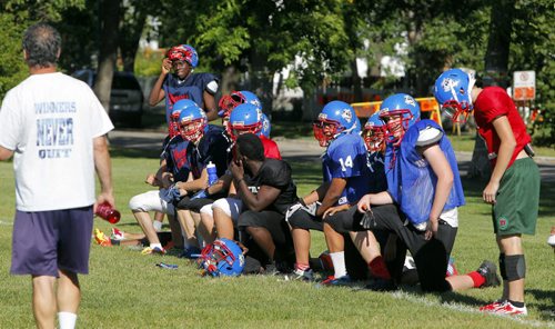 Churchill Highschool Bulldogs football team practice in town before they head to New York for a school trip. Kyle Jahns story. BORIS MINKEVICH / WINNIPEG FREE PRESS. August 21, 2013.