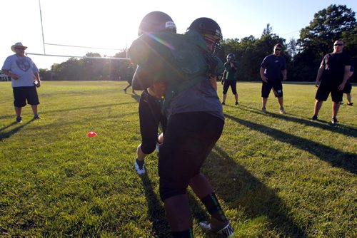 Vincent Massy Trojans highschool football team practicing before they leave this weekend for Hawaii for a football trip. BORIS MINKEVICH / WINNIPEG FREE PRESS. August 21, 2013.
