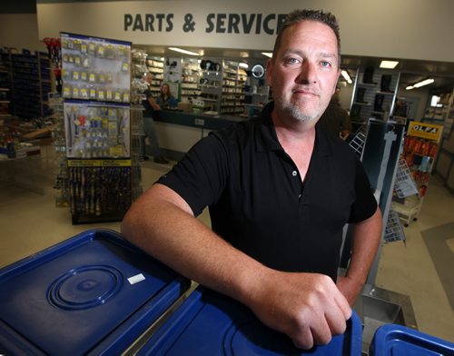 Doug Redekopp poses at Penner Farm Service in Blumnort Thursday. See Martin Cash story re: challenges for small business owners filling job vacancies and training services. August 22, 2013 - (Phil Hossack / Winnipeg Free Press)