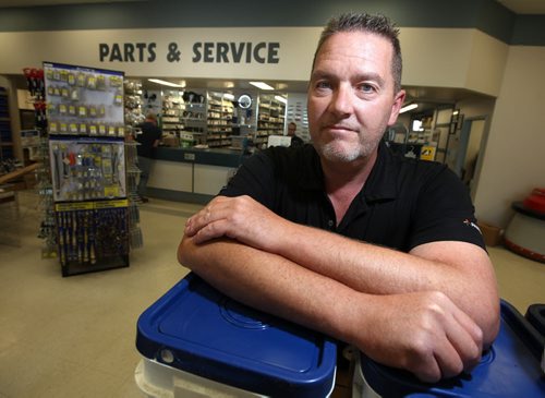 Doug Redekopp poses at Penner Farm Service in Blumnort Thursday. See Martin Cash story re: challenges for small business owners filling job vacancies and training services. August 22, 2013 - (Phil Hossack / Winnipeg Free Press)