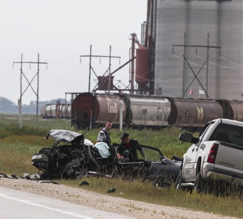 A crash involving two vehicles occurred on Highway 3 about 2-kms West of Brunkild, Man. today around 4 p.m. One infant and one child were among the victims. Two people were dead at the scene, and the others transported to hospital. Saturday, August 24, 2013. (JESSICA BURTNICK/WINNIPEG FREE PRESS)