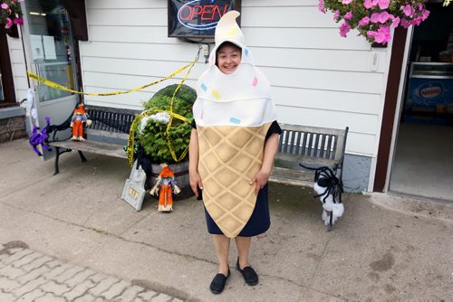 Brandon Sun 24082013 Sandy Shwetz with The Boardwalk on Clear Lake sports an ice cream cone costume while taking part in Boo in the Park in Wasagaming on Saturday. The annual events brings Halloween to the park early for children at the lake. Kids dress up in costumes, play games, trick or treat and take part in other special events. (Tim Smith/Brandon Sun)