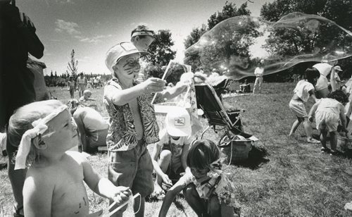40 years of Folk Fest -- Kevin Muir blows giant bubbles while sister Carolyn watches on July 8, 1988. (DAVE JOHNSON/WINNIPEG FREE PRESS ARCHIVES) winnipeg folk festival. fparchives
