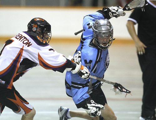 August 25, 2013 - 130825  -  Brodie Tansley (7)(L) of the Six Nations Rebels defeated Mitch Grant (10) and the Calgary Mountaineers in the Founders Cup final at St Norbert Arena Sunday, August 25, 2013. John Woods / Winnipeg Free Press