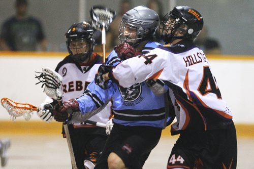 August 25, 2013 - 130825  -  Zed Williams (44)(R) of the Six Nations Rebels defeated Colin Stogryn (9) and the Calgary Mountaineers in the Founders Cup final at St Norbert Arena Sunday, August 25, 2013. John Woods / Winnipeg Free Press