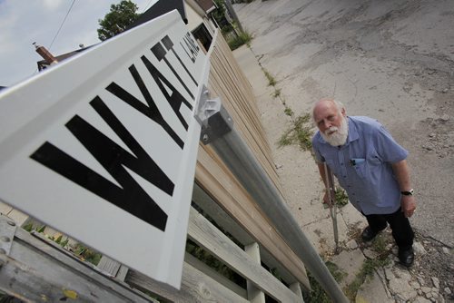 August 26, 2013 - 130826  -  Winnipeg city councillor Harvey Smith is photographed with one of the signs he had installed in back lanes in his ward Monday, August 26, 2013. Smith is upset at the condition of the lanes. John Woods / Winnipeg Free Press