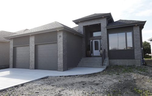 New Homes Äì 50 Van Hull  Way in St. Vital - exterior  -todd lewys story  KEN GIGLIOTTI / Aug 27 2013 / WINNIPEG FREE PRESS