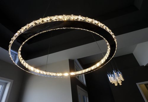 New Homes Äì 50 Van Hull  Way in St. Vital - ultra modern diamond ring lighting chandelier  for diningroom and  equally  modern lighting for main entrance -todd lewys story  KEN GIGLIOTTI / Aug 27 2013 / WINNIPEG FREE PRESS
