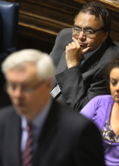 Deputy Premier Eric Robinson listens as Premier Greg Selinger defends his reputation in the house of the Manitoba Legislature Tuesday afternoon- Question after question are being asked today by the opposition about a what they call racist email that was uncovered. They are asking Robinson to resign- See Larry Kusch story- August 27, 2013   (JOE BRYKSA / WINNIPEG FREE PRESS)