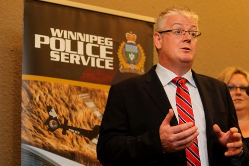 Dr. Joe Sullivan of Mentor Forensic Services teaches Winnipeg Police Child Abuse unit members on specialized child exploitation training. See story. August  27,, 2013 Ruth Bonneville Winnipeg Free Press