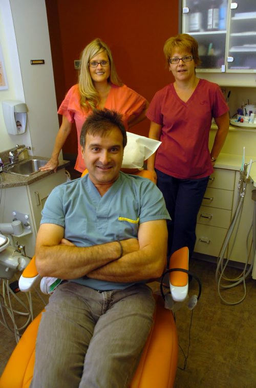 Brandon Sun Dentist Alex Pappas with his assistants Steina Wakefield and Maxine Ingraham. FOR DIANE WEEKEND FEATURE (Bruce Bumstead/Brandon Sun)