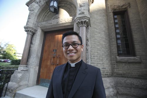 Reverend Geoffrey Angeles has been appointed new rector of St. Mary's Cathedral. Locally born, he is 36 years old and of Filipino descent. Wednesday, August 28, 2013. (BRENDA SUDERMAN) (JESSICA BURTNICK/WINNIPEG FREE PRESS)