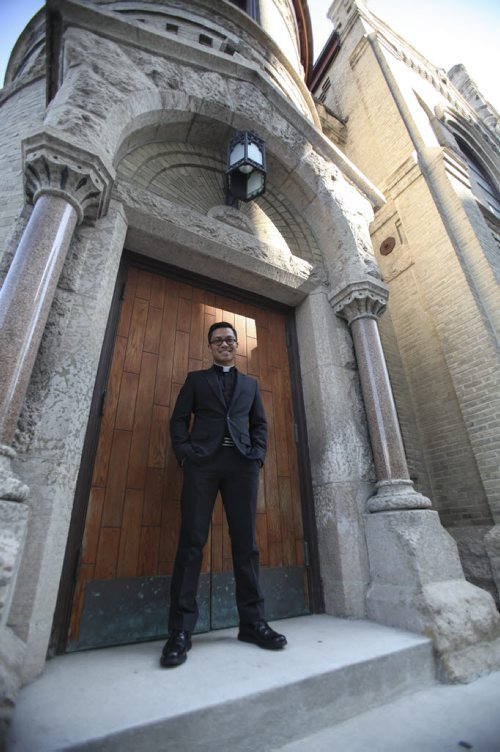 Reverend Geoffrey Angeles has been appointed new rector of St. Mary's Cathedral. Locally born, he is 36 years old and of Filipino descent. Wednesday, August 28, 2013. (BRENDA SUDERMAN) (JESSICA BURTNICK/WINNIPEG FREE PRESS)