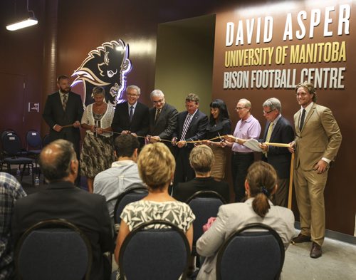 The official ribbon-cutting ceremony at the opening of the David Asper University of Manitoba Bison Football Centre at Investors Group Field. Wednesday, August 28, 2013. (ASHLEY PREST) (JESSICA BURTNICK/WINNIPEG FREE PRESS)