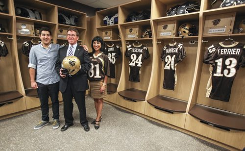 David Asper (centre) with his wife Ruth (right) at the official opening of the David Asper University of Manitoba Bison Football Centre at Investors Group Field. Wednesday, August 28, 2013. (ASHLEY PREST) (JESSICA BURTNICK/WINNIPEG FREE PRESS)