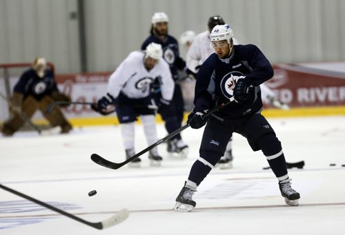 Winnipeg jets player hold an informal skate at the Jets Iceplex  practice facility Äì among the players was new Jet RW ,  Devon Setoguchi , former Shark and recently the Minnesota Wild  KEN GIGLIOTTI / Aug 30 2013 / WINNIPEG FREE PRESS