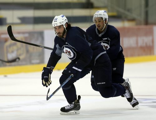 Winnipeg jets player hold an informal skate at the Jets Iceplex  practice facility Äì among the players was  #22 Chris Thornburn and new Jet RW ,  Devon Setoguchi , former Shark and recently the Minnesota Wild  KEN GIGLIOTTI / Aug 30 2013 / WINNIPEG FREE PRESS