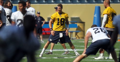 Blue Bomber QB Justin Goltz takes a wide stance Friday at the morning workout. Ed Tait story. August 30, 2013 - (Phil Hossack / Winnipeg Free Press)