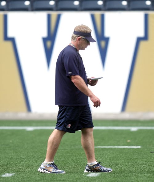 Blue Bomber Head Coach Tim Burke Friday at the morning workout. Ed Tait story. August 30, 2013 - (Phil Hossack / Winnipeg Free Press)