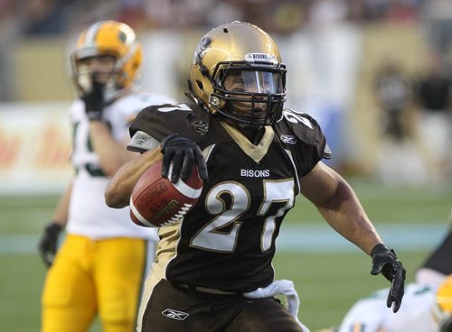 Manitoba Bisons Kienan LaFrance scores first touchdown in the first quarter in the new Investors Group Field during play against the University of Alberta Golden Bears Friday night  -See story- August 30, 2013   (JOE BRYKSA / WINNIPEG FREE PRESS)