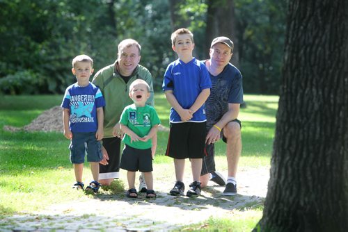 Todd Neil, Lynch Syndrome advocate is lobbying the province to pay for Lynch Syndrome screening.  He will be participating with his family and friends in the upcoming Kick Butt walk/run to raise money for Colorectal Cancer.   Names from left - Todd Neil and his two sons Kerrick - 4yrs and Brennan - 2yrs, also Kevin Neil and his son Jaden -7yrs (right side) August  31,, 2013 Ruth Bonneville Winnipeg Free Press