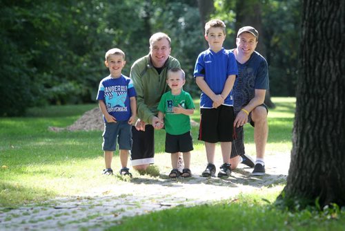 Todd Neil, Lynch Syndrome advocate is lobbying the province to pay for Lynch Syndrome screening.  He will be participating with his family and friends in the upcoming Kick Butt walk/run to raise money for Colorectal Cancer.   Names from left - Todd Neil and his two sons Kerrick - 4yrs and Brennan - 2yrs, also Kevin Neil and his son Jaden -7yrs (right side) August  31,, 2013 Ruth Bonneville Winnipeg Free Press