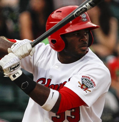 Kevin Moesquit appears to find a place of zen before taking a swing for the opponent's pitch. The Winnipeg Goldeyes face off tonight against the Fargo-Moorhead Redhawks at Shaw Park in Winnipeg. Saturday, August 31, 2013. (MELISSA MARTIN) (JESSICA BURTNICK/WINNIPEG FREE PRESS)