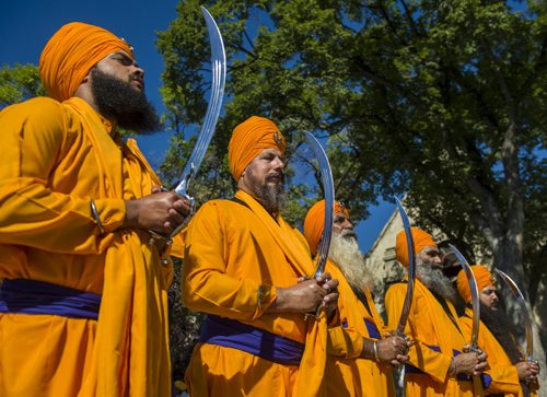 130901 Winnipeg - DAVID LIPNOWSKI / WINNIPEG FREE PRESS (September 01, 2013) Holy Sikh Priests symbolically protect the Guru Granth Sahib during Nagar Kirtan. Thousands of Sikh people participated in the annual Nagar Kirtan celebration which included a religious parade that finished at Memorial Park Sunday afternoon.