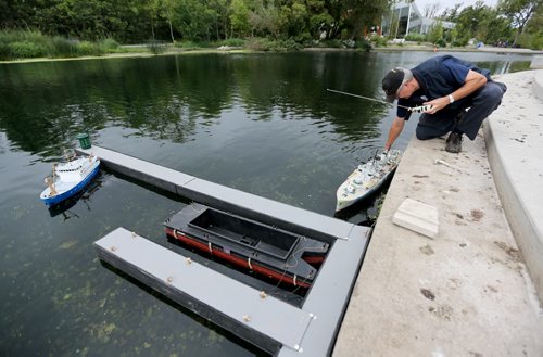 Colin Cassidy, a member of The Winnipeg Model Boat Club with his model of the Price Robert during a regatta in the Duck Pond in Assiniboine Park, Sunday, September 1, 2013. (TREVOR HAGAN/WINNIPEG FREE PRESS)