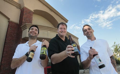From left,  Paulo Brochado,G.M., restaurateur Noel Bernier and Chef Paul Stafford in front of the soon to be a craft beer pub called Barley Brothers formerly a Kelseys restaurant at 655 Empress St. Murray McNeill story Wayne Glowacki / Winnipeg Free Press Sept. 3 2013