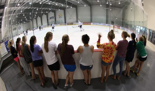 Girls from St Marys Academy ice hockey team had front row view of the Winnipeg Jets practicing at the MTS Iceplex Tuesday -See Paul Wiecek and Gary Lawless stories- Sept 03, 2013   (JOE BRYKSA / WINNIPEG FREE PRESS)