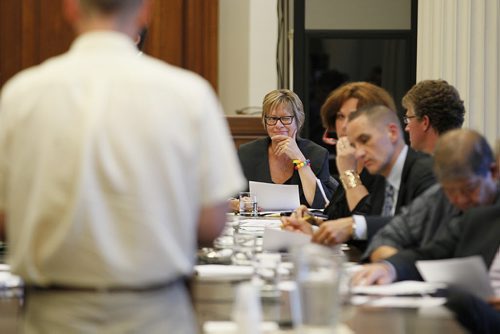 September 3, 2013 - 130903  -  Manitoba Education Minister Nancy Allan winks at Andrew Swan, Minister of Justice and Attorney General as Peter Wohlgemut presents to the Standing Committee on Human Resources at the Bill 18 Hearings at the Manitoba Legislature Tuesday September 9, 2013.  John Woods / Winnipeg Free Press