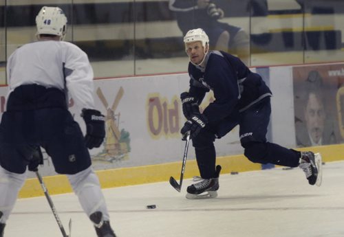 Some Winnipeg Jets players and rookies take part in an informal practice at the MTS Iceplex Wednesday morning. Jets forward #12 Olli Jokinen at right. Gary Lawless Story. Wayne Glowacki / Winnipeg Free Press Sept. 4 2013
