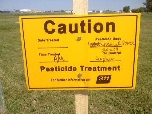 Canstar Community News This sign at St. James Memorial Park warned park users that a pesticide called Ground Force 20239 had been used to get rid of gophers in the park. JORDAN THOMPSON