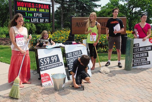 Canstar Community News The World Vision University of Manitoba Student Group publicly protests child labour Saturday afternoon by demonstrating the harsh realities faced by children in other countries. JORDAN THOMPSON/CANSTAR COMMUNITY NEWS
